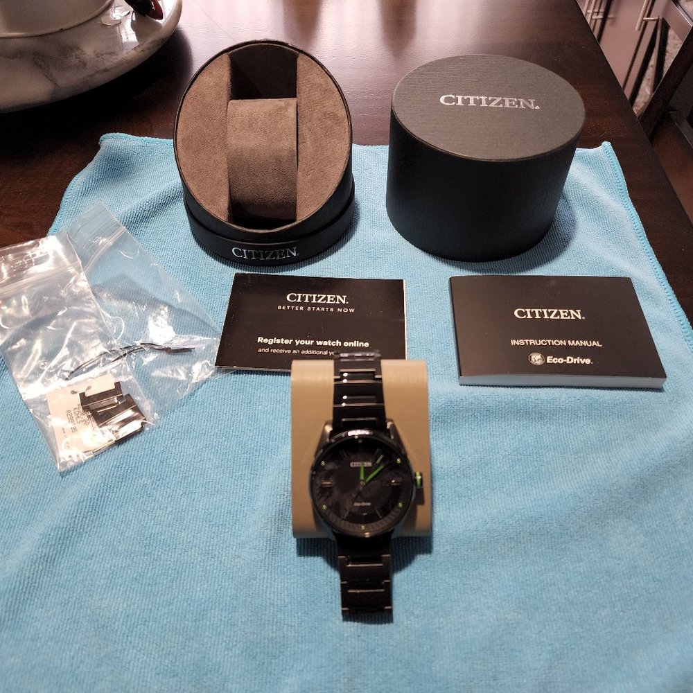 Black And Green Citizen Watch